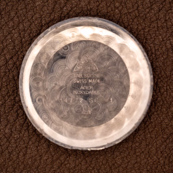 Omega 14772 inner caseback stamped FAB. SUISSE, SWISS MADE, ACIER INOXYDABLE with reference 14772 SC