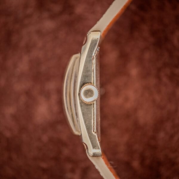 Longines 2148-1 side profile showing the tall boxed acrylic crystal and signed Longines crown