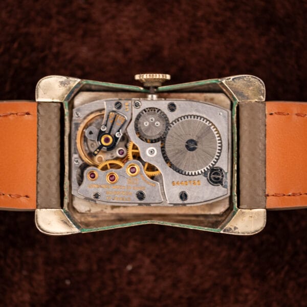 Longines caliber 9LT manual-wind movement filling the rectangular case, signed LONGINES WATCH CO SWISS