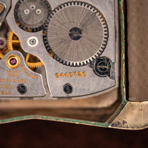 Longines caliber 9LT movement with serial 9445728 stamped beside the barrel and train bridge