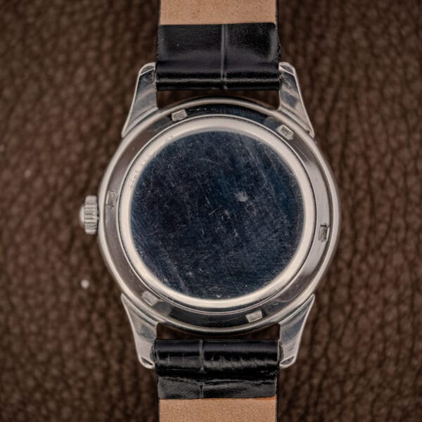 Girard-Perregaux Gyromatic 6170 plain stainless steel snap caseback with honest light surface wear