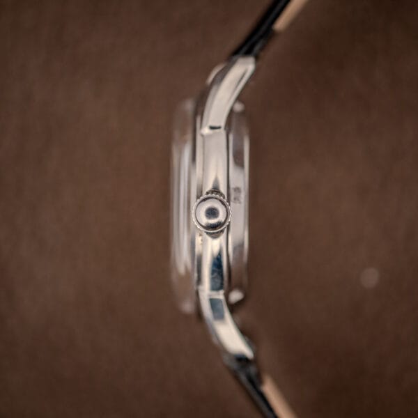 Girard-Perregaux 6170 stainless steel case side profile with fluted crown and lightly domed crystal