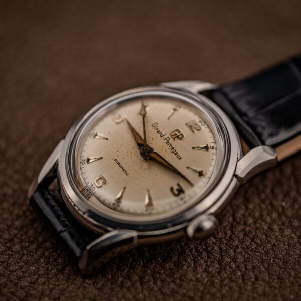 Girard-Perregaux Gyromatic Ref. 6170 cream dial three-quarter studio shot with central seconds and leaf hands