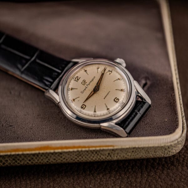Girard-Perregaux Gyromatic 6170 resting on its original cream Girard-Perregaux presentation box