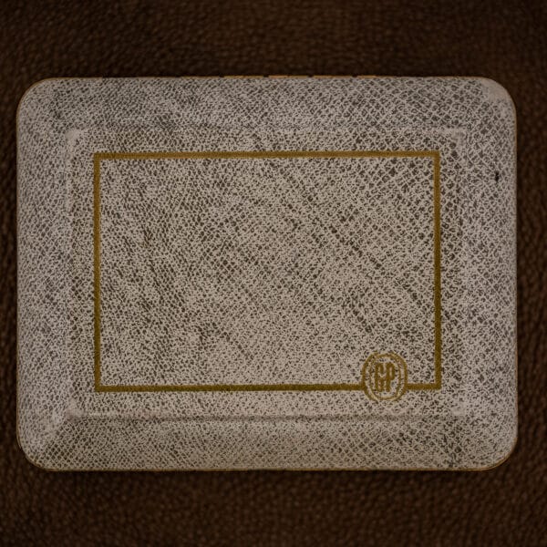 Original Girard-Perregaux box lid in cream leatherette with gold border and embossed gold GP monogram