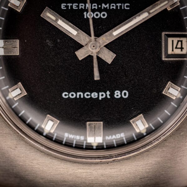 Eterna Concept 80 dial detail showing concept 80 script and SWISS MADE printed beneath six oclock