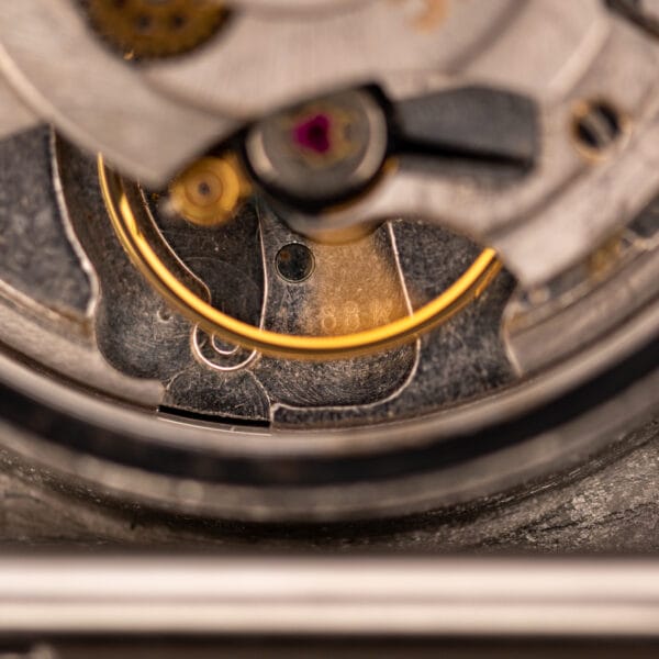 Eterna caliber 1488K balance wheel and movement bridge stamped 1488K in close-up