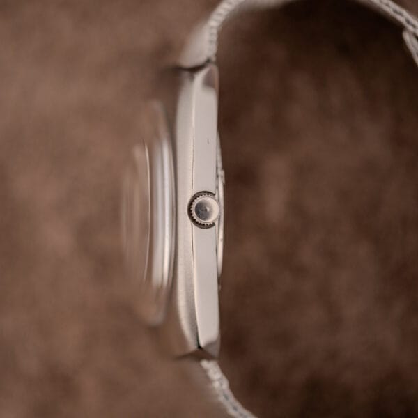 Eterna Matic 1000 case side profile showing the crown and high domed acrylic crystal
