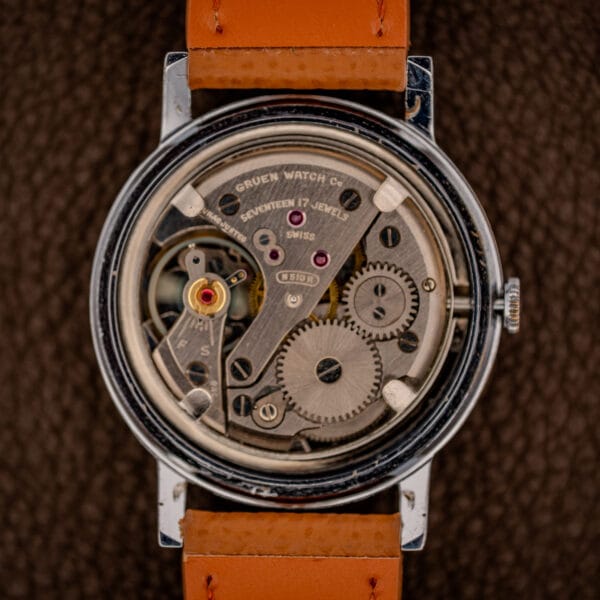 Gruen caliber N510R 17-jewel manual movement gear train viewed through open caseback