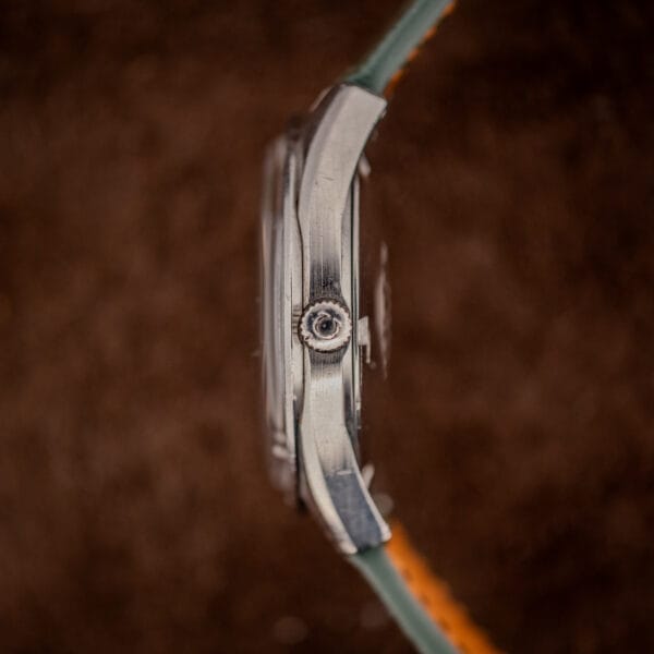 Omega Seamaster 166.028 stainless steel case side profile with signed Omega crown