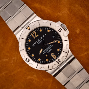 Bulgari Diagono Scuba SD38S black chronometer dial and scalloped steel diver bezel on original steel bracelet