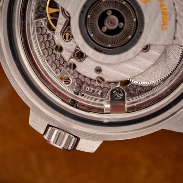 Bulgari Diagono Scuba movement detail showing perlage, Cotes de Geneve striping and gold balance wheel