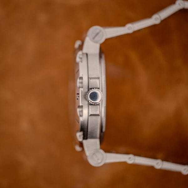 Bulgari Diagono Scuba side profile showing screw-down crown and exposed-screw steel bracelet links