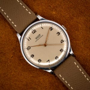 Tissot Antimagnetique ref 66718 cream dial with gilt Arabic numerals and rose-gilt leaf hands, full front view