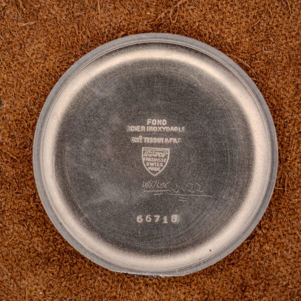 Tissot 66718 inner caseback stamped FOND ACIER INOXYDABLE CHs TISSOT & FILS with Tissot shield and reference 66718