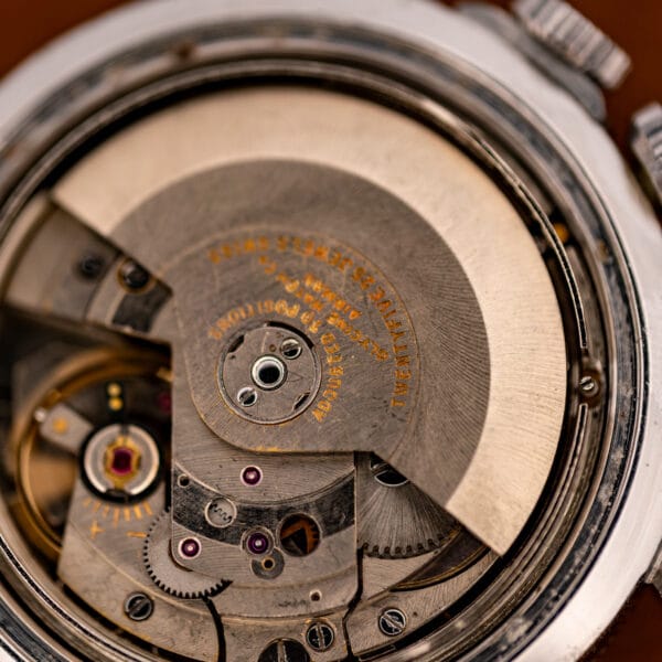 Glycine Airman self-winding movement macro, gold-engraved rotor adjusted to several positions