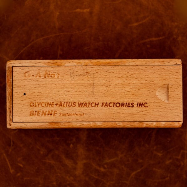 Original Glycine box stamped GLYCINE ALTUS WATCH FACTORIES INC BIENNE Switzerland, wooden base