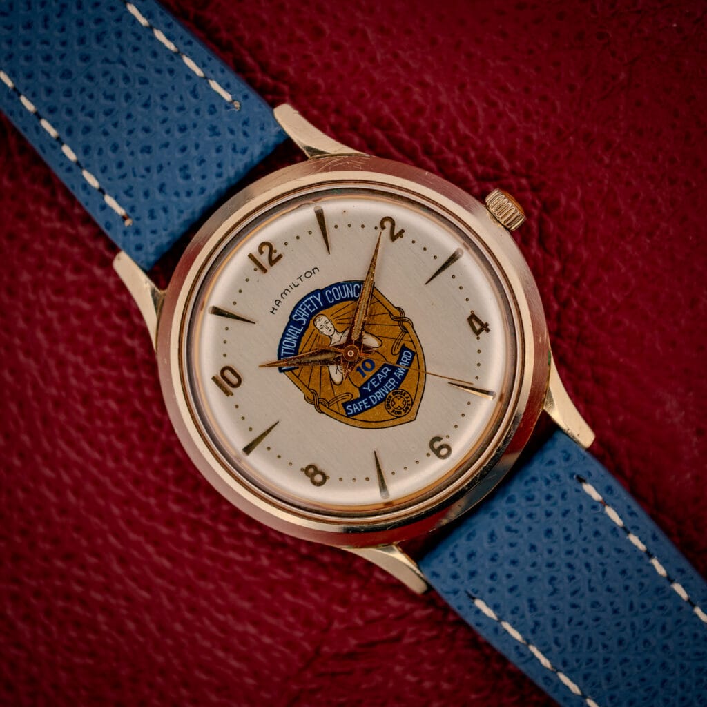Hamilton Thin-O-Matic in 10k gold filled case with National Safety Council Safe Driver Award dial on a blue leather strap