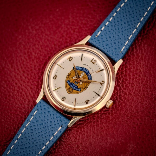 Hamilton Thin-O-Matic on a blue leather strap, National Safety Council Safe Driver Award dial and gold filled case