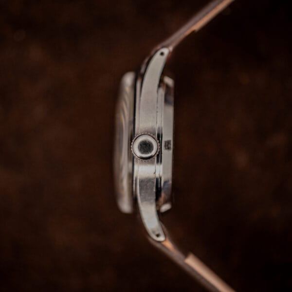 Vintage Eterna Cal. 835 side profile, fluted signed-style crown and polished stainless case band