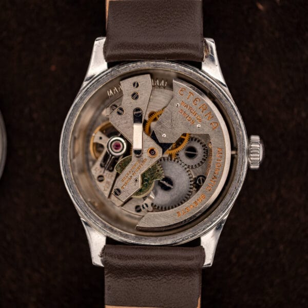 Eterna caliber 835 bumper movement, signed ETERNA WATCH Co SWISS, oscillating weight and buffer springs