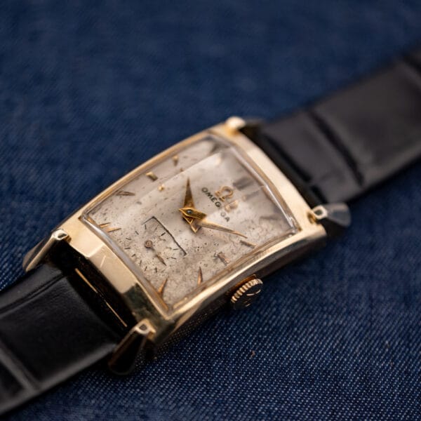 Vintage Omega Tank N-6243 three-quarter view of the stepped 14k gold filled Art Deco case