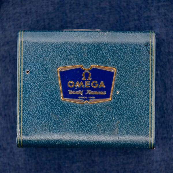 Original Omega box exterior with crest reading OMEGA World Famous SINCE 1848