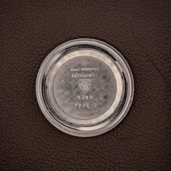 Tissot 6769 inner caseback stamped ACIER INOXYDABLE CHS TISSOT&FILS reference 6769 case code 5770-7 SWISS