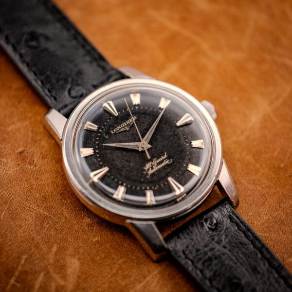 Longines All Guard black dial automatic, dauphine hands and faceted markers, three-quarter view