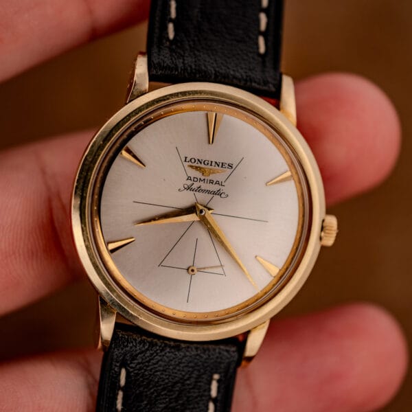 Longines Admiral automatic ref. 69-240 silver dial in hand with subsidiary seconds and faceted gold dart markers