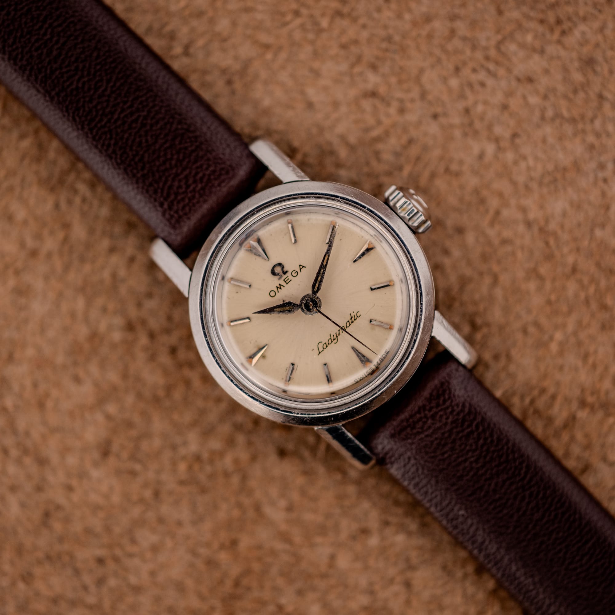 DSCF4076 Omega Ladymatic ref. 11000-7 silver dial and stainless case on brown leather strap, top-down view