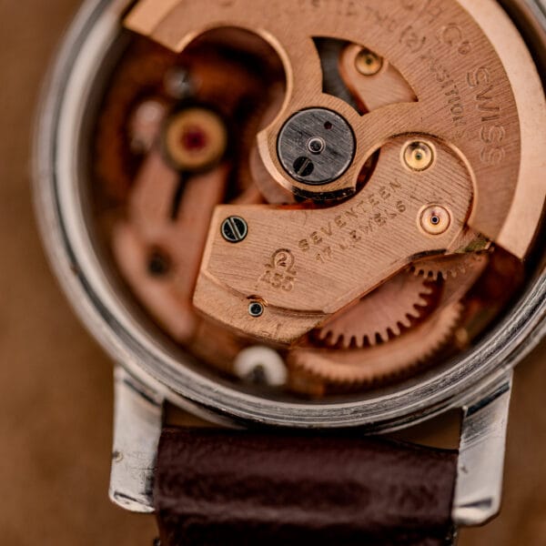 Omega caliber 455 bridge stamped Omega 455 and SEVENTEEN 17 JEWELS, copper gilt automatic movement