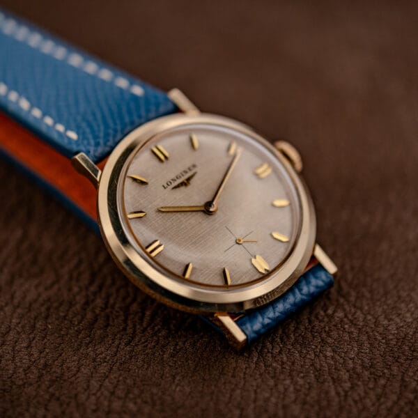 Longines Ref. 1116 gold filled dress watch on a blue grained leather strap with cognac lining