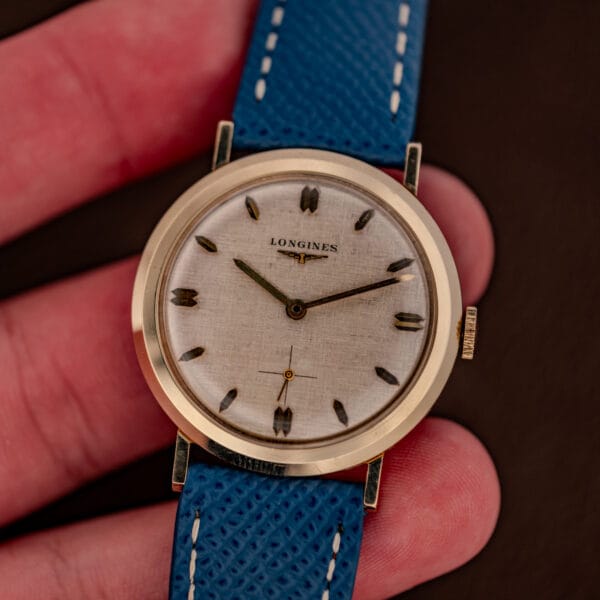 Longines 1116 linen dial with applied faceted markers and sub-seconds at six in a gold filled case