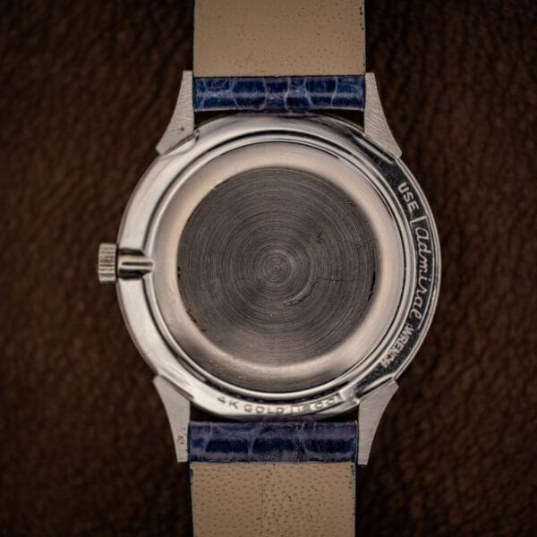 Longines outer caseback stamped 14K GOLD with case number and a USE maker WRENCH instruction