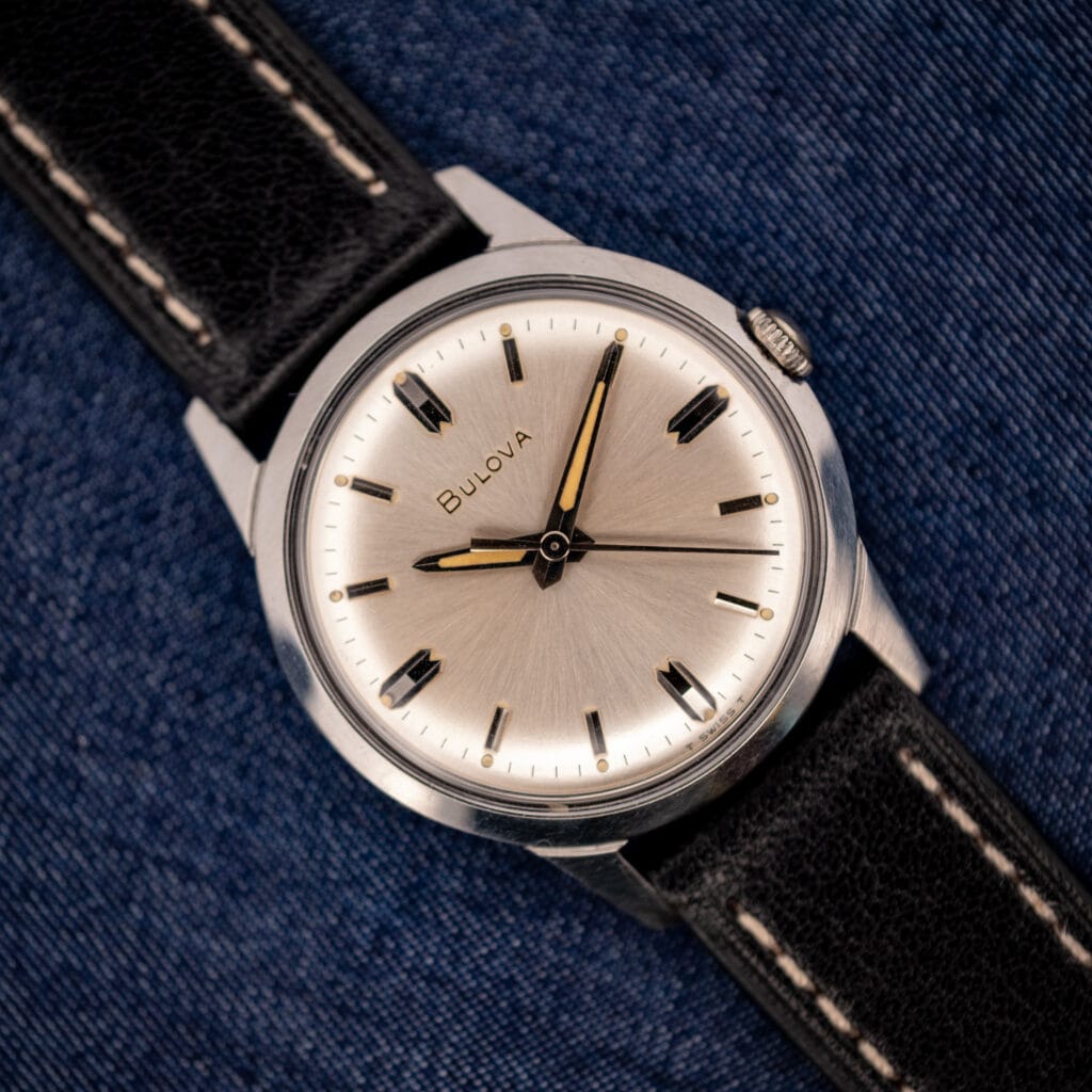 Vintage Bulova cal. 11BLC silver sunburst dial with dauphine hands in stainless steel on black leather strap