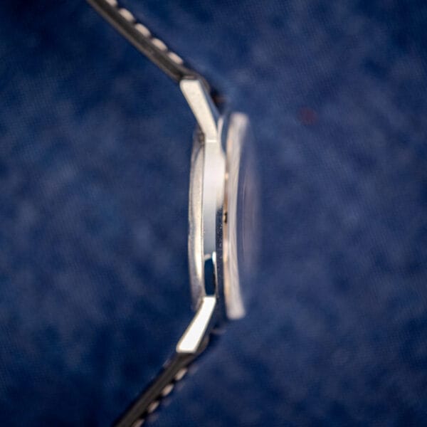 Vintage Bulova stainless steel case lug profile and polished bezel side view