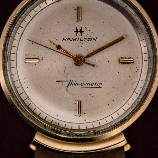 Vintage Hamilton Thin-O-Matic T-406 silvered dial and Thin-o-matic script with aged spotting near the gold-filled bezel