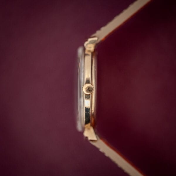 Hamilton Thin-O-Matic thin gold-filled case side profile showing signed crown and hooded lug detail