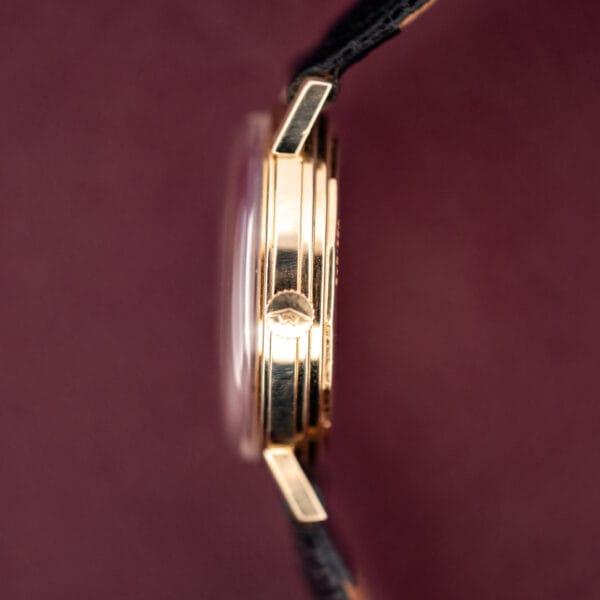 Movado Kingmatic S case profile showing Movado-signed crown and slim 14k gold filled Sub-Sea case