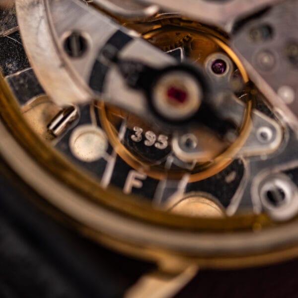 Movado Kingmatic S movement detail, caliber 395 F stamping beside the ruby-jeweled balance