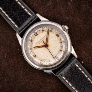 Vintage Girard-Perregaux caliber 84 bumper automatic, off-white military-style dial on a black leather strap