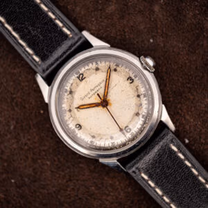 Vintage Girard-Perregaux caliber 84 bumper automatic, off-white military-style dial on a black leather strap