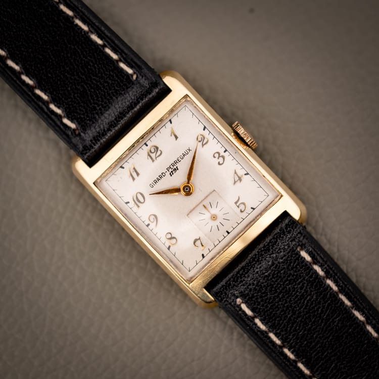 DSCF4339 Girard-Perregaux 1791 gold filled tank watch with cream dial and applied gold Arabic numerals on a black leather strap