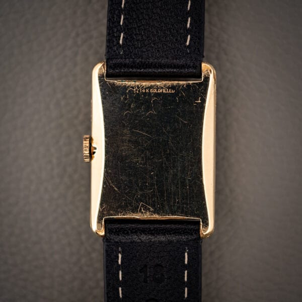 Girard-Perregaux 1791 plain domed outer caseback with 14K gold filled stamping and honest hairline wear
