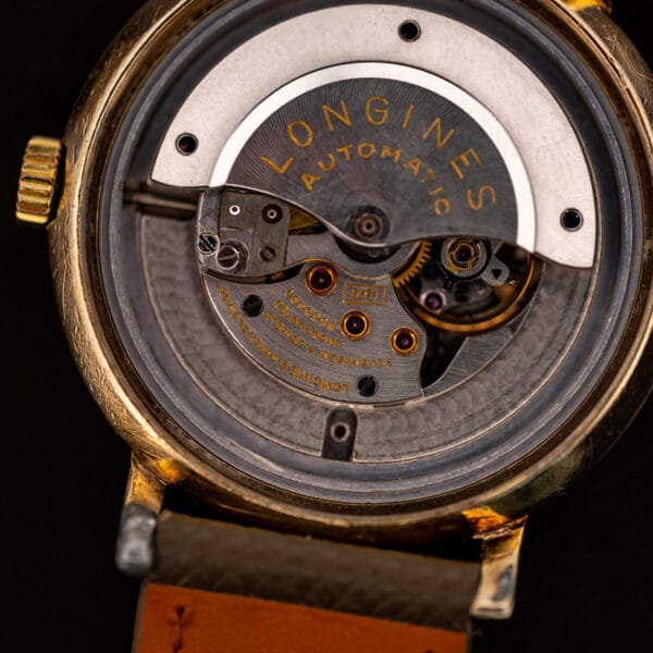 Longines caliber 19A automatic rotor engraved LONGINES AUTOMATIC over striped bridges, ref 2264-1 movement