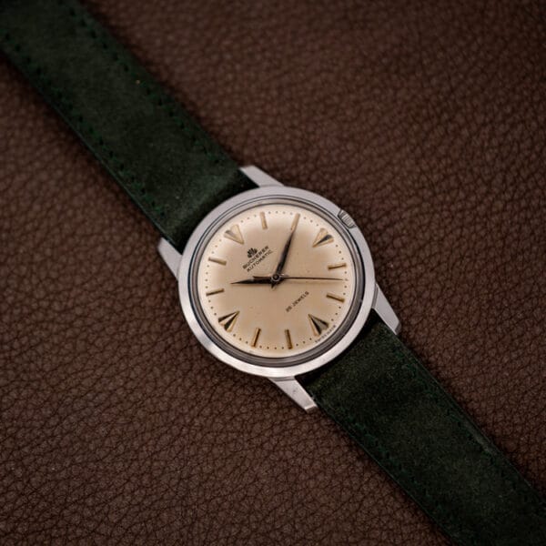 Vintage Bucherer Ref. 6232 stainless steel automatic angled on brown leather with green suede strap