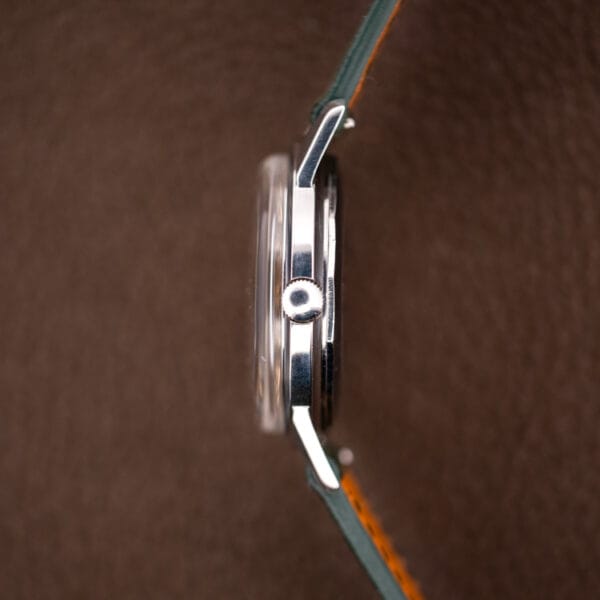 Bucherer 6232 stainless steel case profile with knurled crown and domed crystal