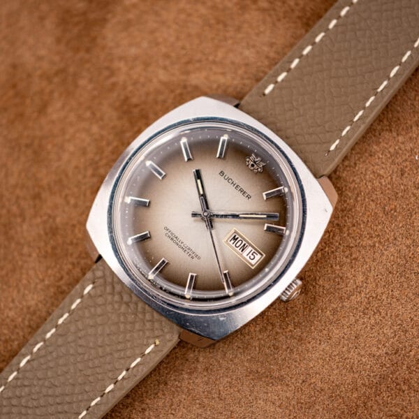 Angled Bucherer cushion stainless steel case, signed crown and ombre chronometer dial with day-date at three
