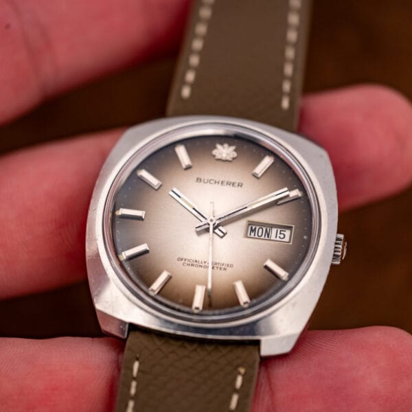Bucherer automatic chronometer in hand, applied crest and Officially Certified Chronometer dial text visible